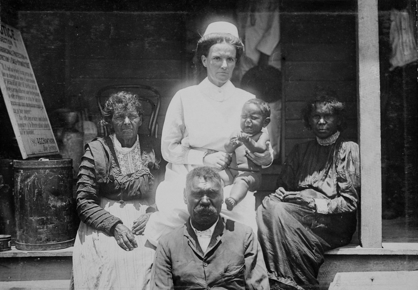 Three generations with the settlement nurse, 1911