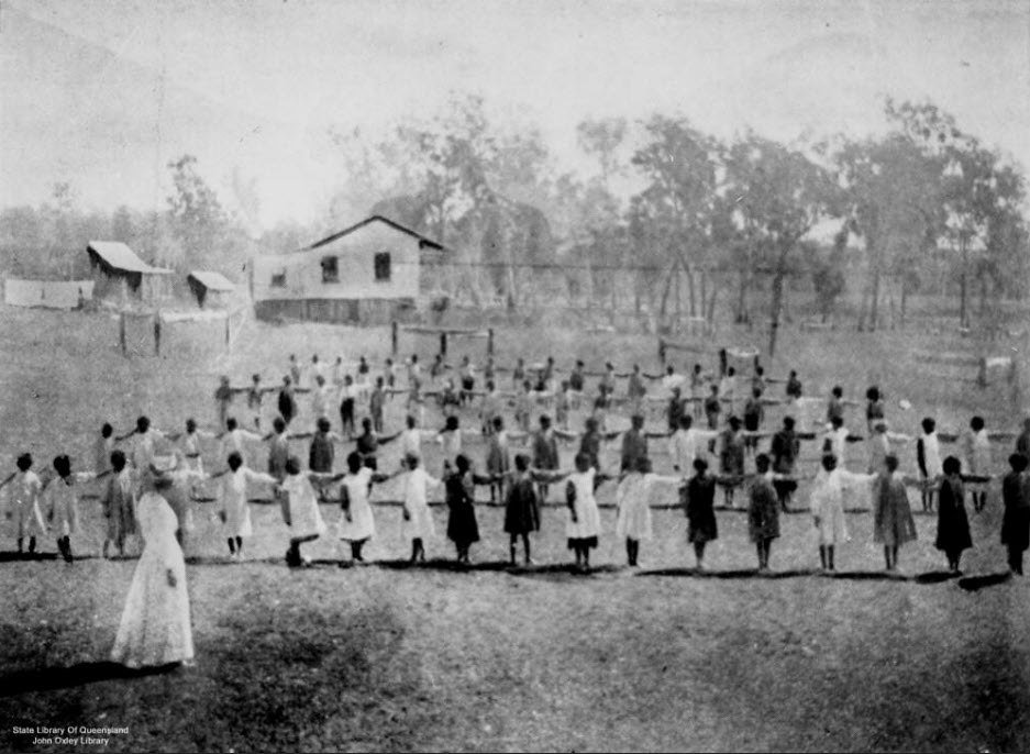 Children at drill outside the school, Barambah