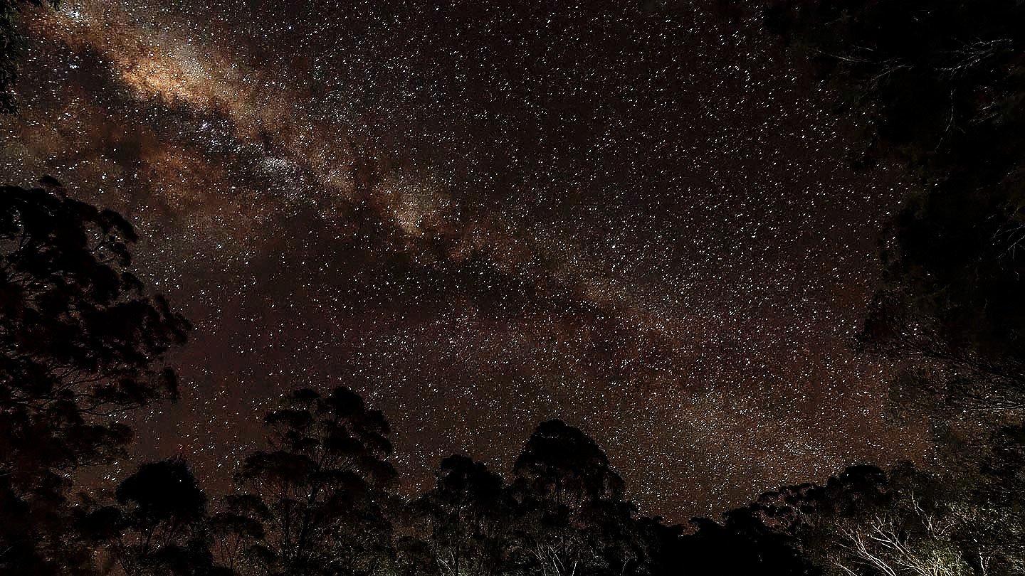 The deep dark of inland Queensland night sky, or the deep shadow of country at dusk.
