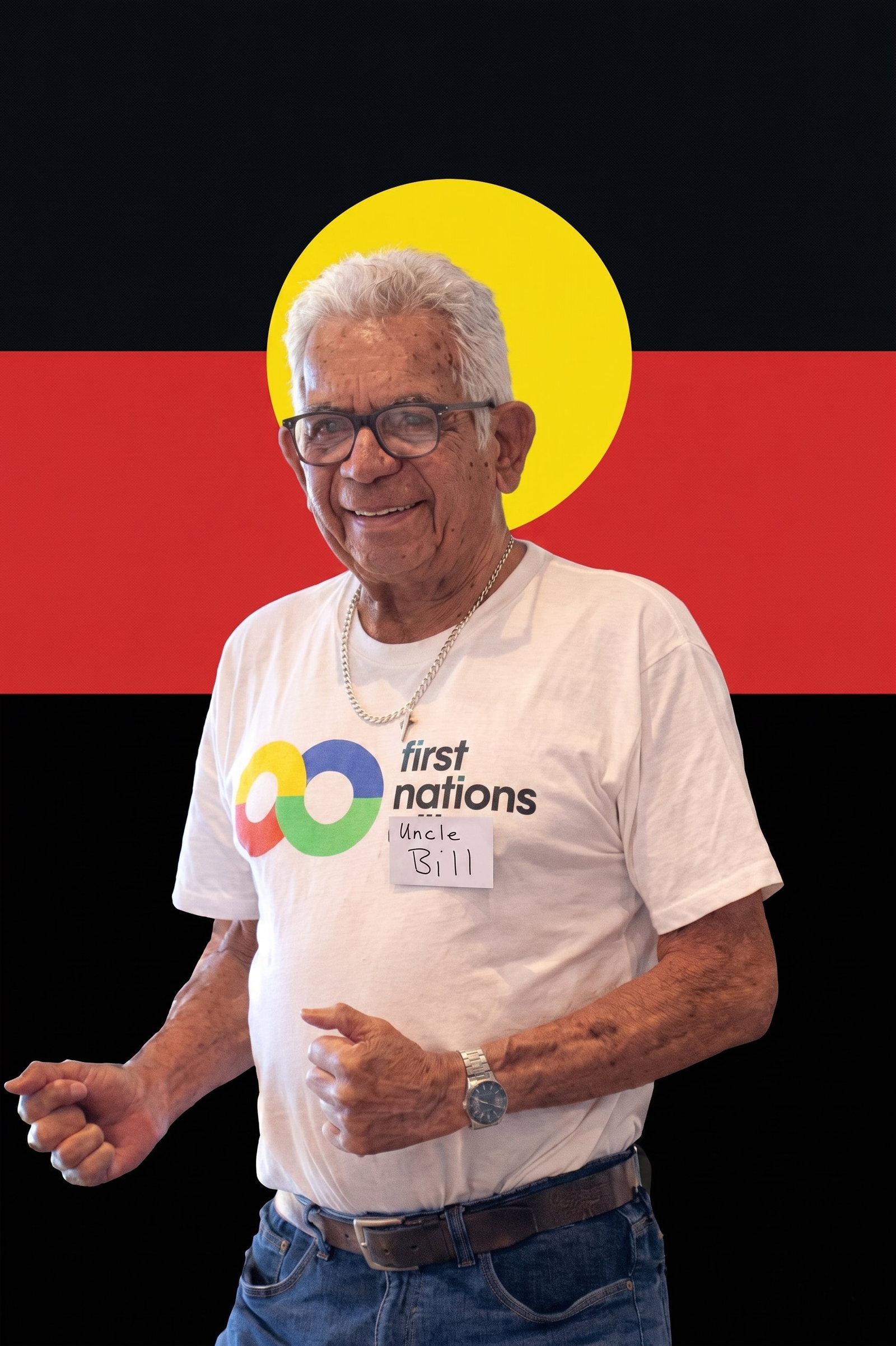 Uncle Bill Lemson, a respected Indigenous Elder, pictured in front of the Aboriginal Flag.